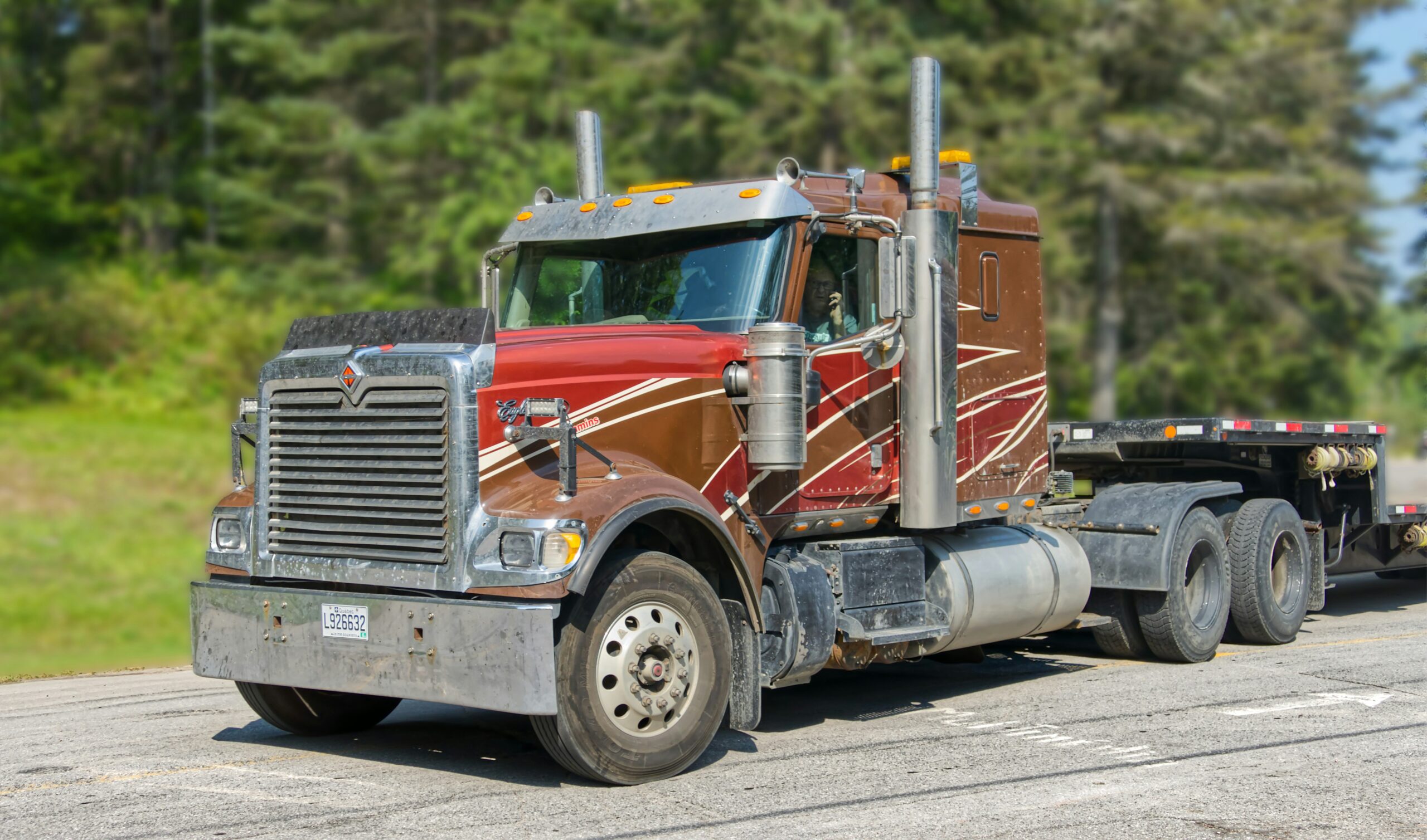 owner operator semi truck on the road