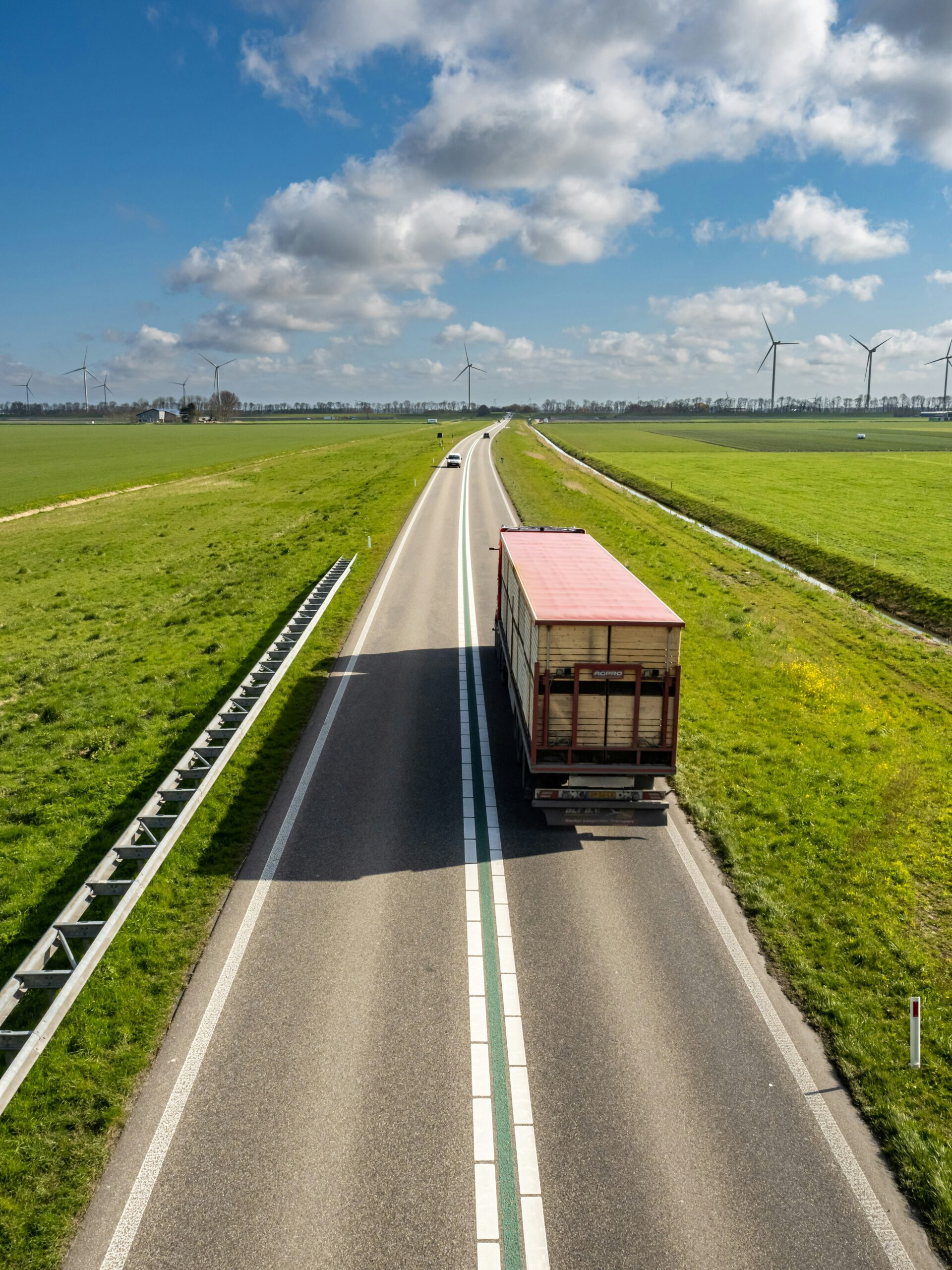 Semi truck hauling freight on open highway — how to find loads as an owner operator